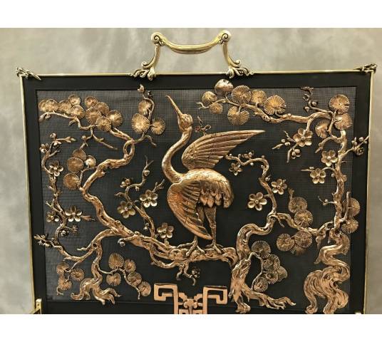 Pare fire screen of antique fireplace in bronze and vintage brass circa 1900