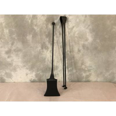 A blackened iron chimney with a shovel and a clamp 18 th