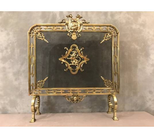 Polished bronze fireplace screen and epoch 19 th
