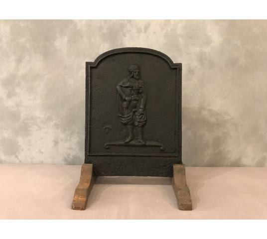 Small antique fireplace insert at the end of the period 18 th