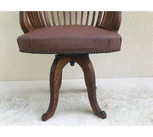 American office chair in model oak rotating around 1900