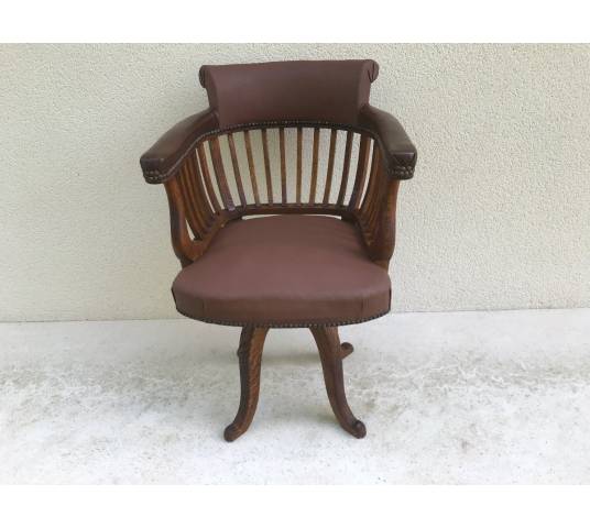 American office chair in model oak rotating around 1900