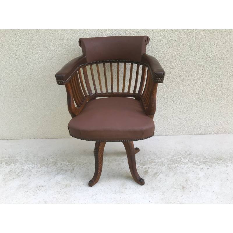 American office chair in model oak rotating around 1900