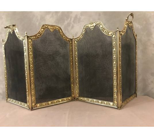 Pare fire of antique fireplace in vintage pressed brass 19 th