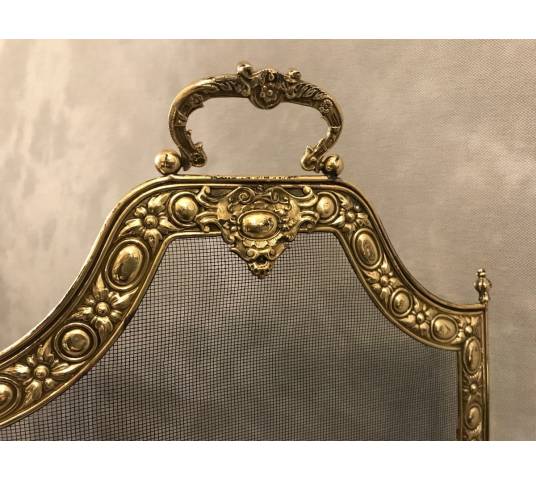 Pare fire of antique fireplace in vintage pressed brass 19 th