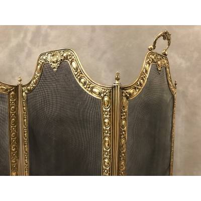 Pare fire of antique fireplace in vintage pressed brass 19 th