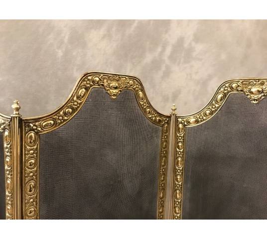 Pare fire of antique fireplace in vintage pressed brass 19 th