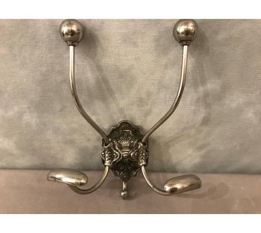 Double coat hook in iron and cast iron from the 19th century