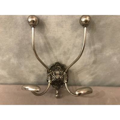 Double coat hook in iron and cast iron from the 19th century