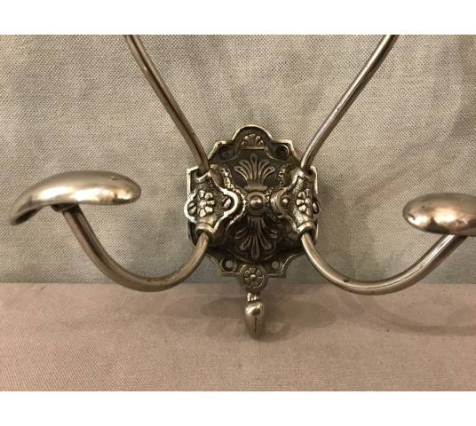 Double coat hook in iron and cast iron from the 19th century