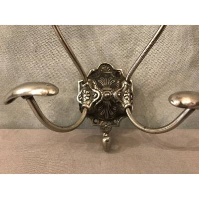 Double coat hook in iron and cast iron from the 19th century