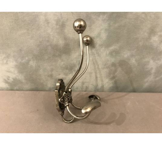 Double coat hook in iron and cast iron from the 19th century