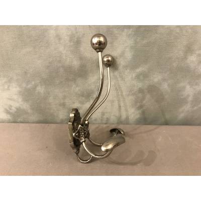 Double coat hook in iron and cast iron from the 19th century