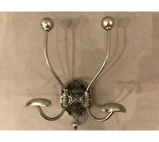 Double coat hook in iron and cast iron from the 19th century