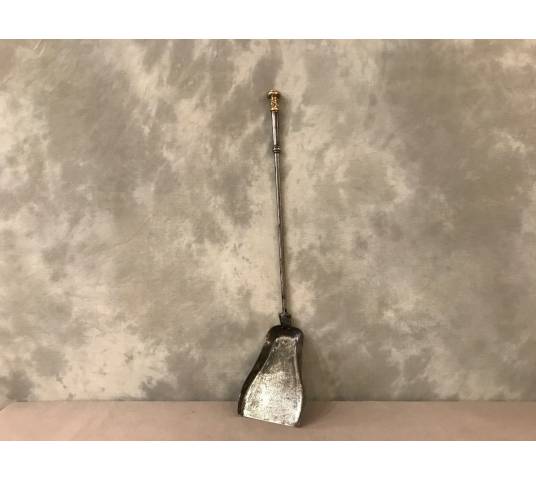 Beautiful old iron and bronze fireplace shovel from the 18th century