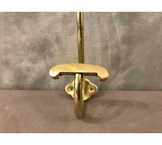 Coat hook, polished and varnished brass coat rack from the 19th century