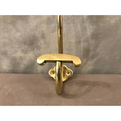 Coat hook, polished and varnished brass coat rack from the 19th century