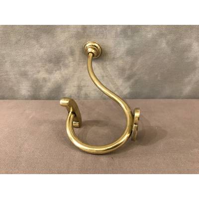 Coat hook, polished and varnished brass coat rack from the 19th century