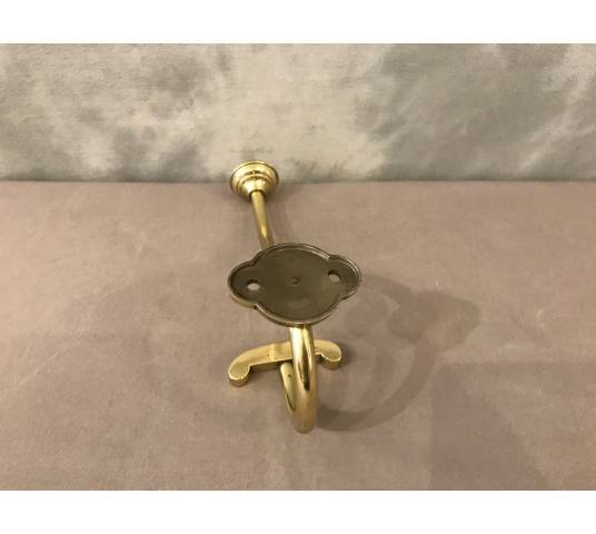 Coat hook, polished and varnished brass coat rack from the 19th century