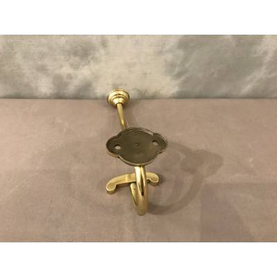 Coat hook, polished and varnished brass coat rack from the 19th century