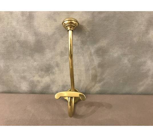 Coat hook, polished and varnished brass coat rack from the 19th century