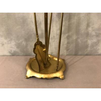 Old brass fireplace servant from the 19th century