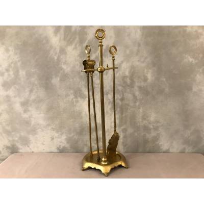 Old brass fireplace servant from the 19th century