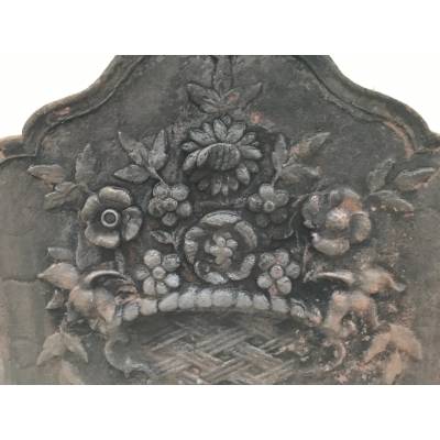 Old cast iron fireplace plate from the 19th century