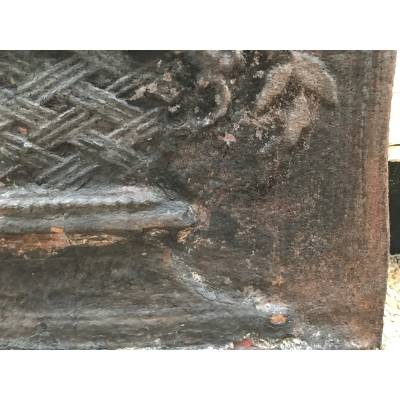 Old cast iron fireplace plate from the 19th century