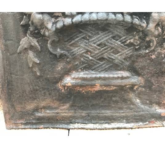 Old cast iron fireplace plate from the 19th century