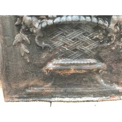 Old cast iron fireplace plate from the 19th century