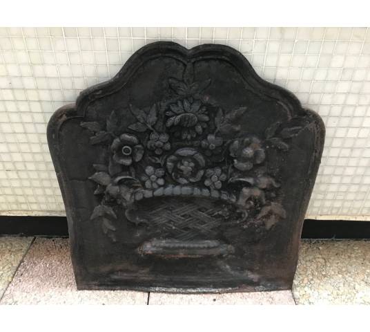 Old cast iron fireplace plate from the 19th century