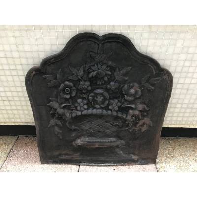 Old cast iron fireplace plate from the 19th century