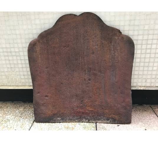 Old cast iron fireplace plate from the 19th century