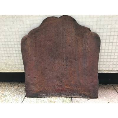 Old cast iron fireplace plate from the 19th century