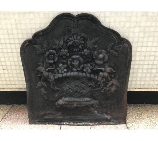 Old cast iron fireplace plate from the 19th century