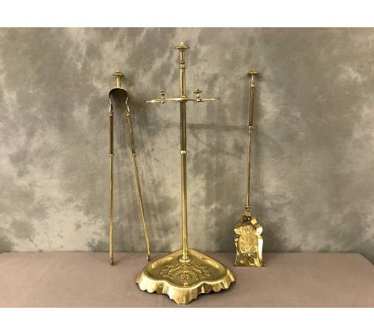 Old brass fireplace servant from the 19th century