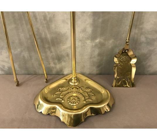 Old brass fireplace servant from the 19th century