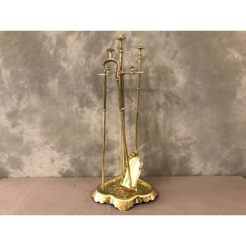 Old brass fireplace servant from the 19th century