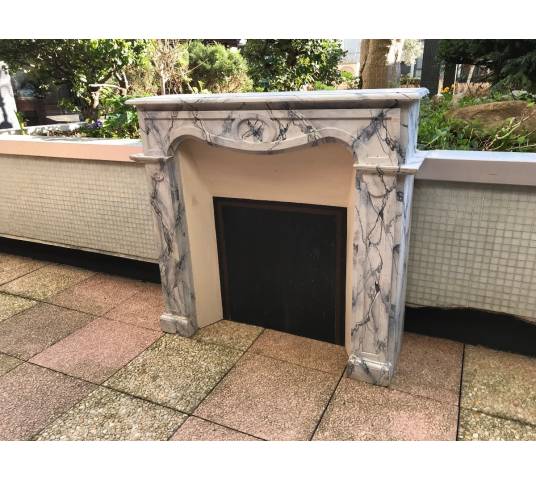 Small decorative fireplace in marbled painted wood from the late 19th century