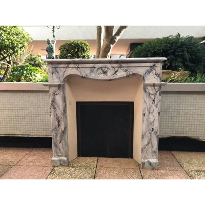 Small decorative fireplace in marbled painted wood from the late 19th century