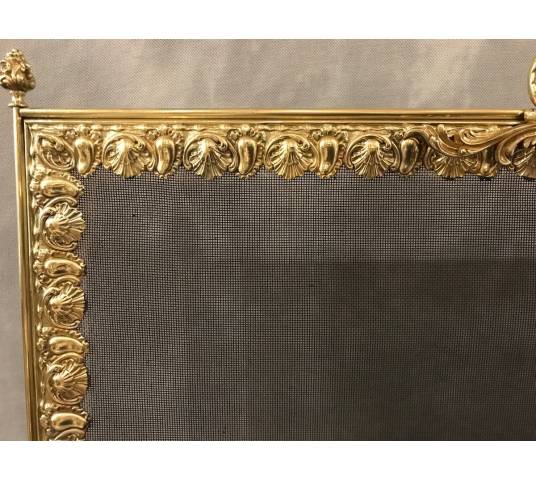 Fireplace firewall, brass fire screen from the 19th century