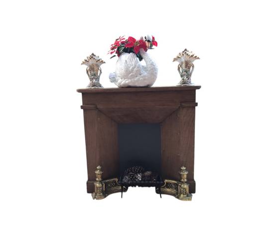 Small decorative fireplace in natural wood from the late nineteenth century