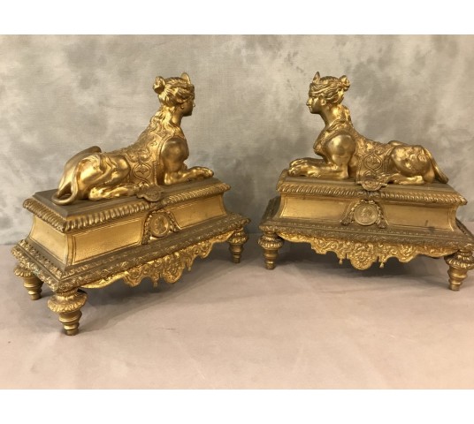 Paire de chenets en bronze gilt aux sphinx d' epoch 19 ème