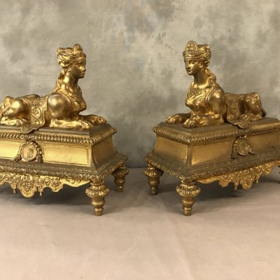 Paire de chenets en bronze doré aux sphinx d'époque 19 ème