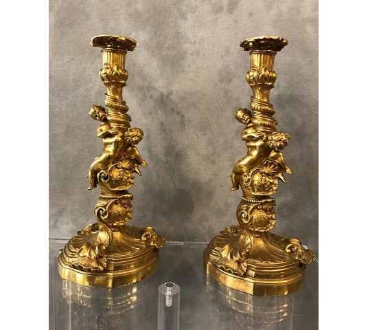 Ravant pair of torches of time 18th Louis XV in gilded bronze