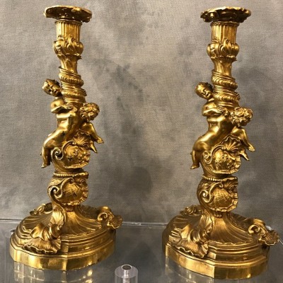 Ravant pair of torches of time 18th Louis XV in gilded bronze