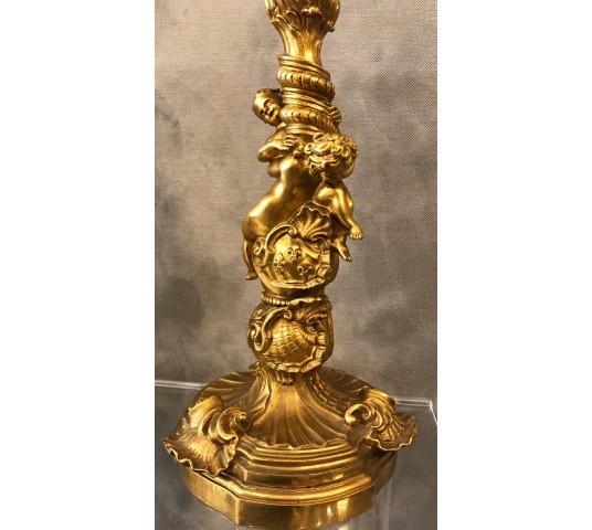 Ravant pair of torches of time 18th Louis XV in gilded bronze