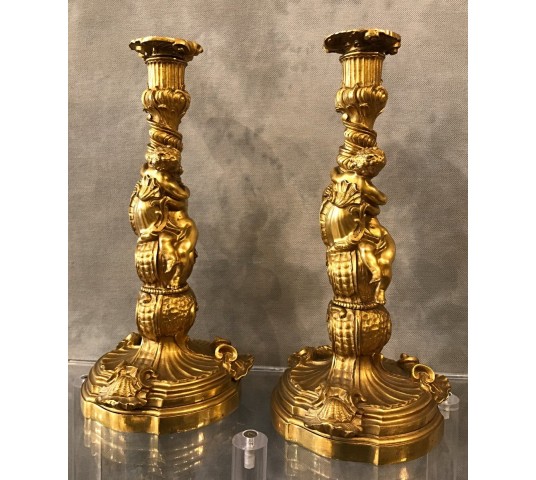 Ravant pair of torches of time 18th Louis XV in gilded bronze