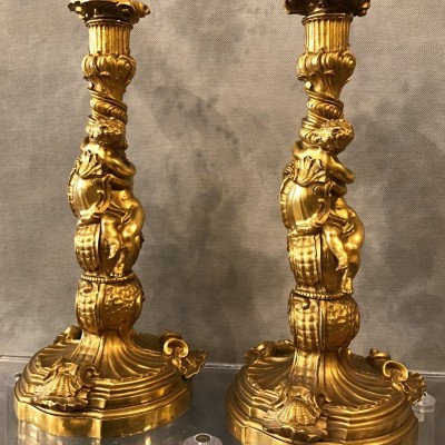 Ravant pair of torches of time 18th Louis XV in gilded bronze